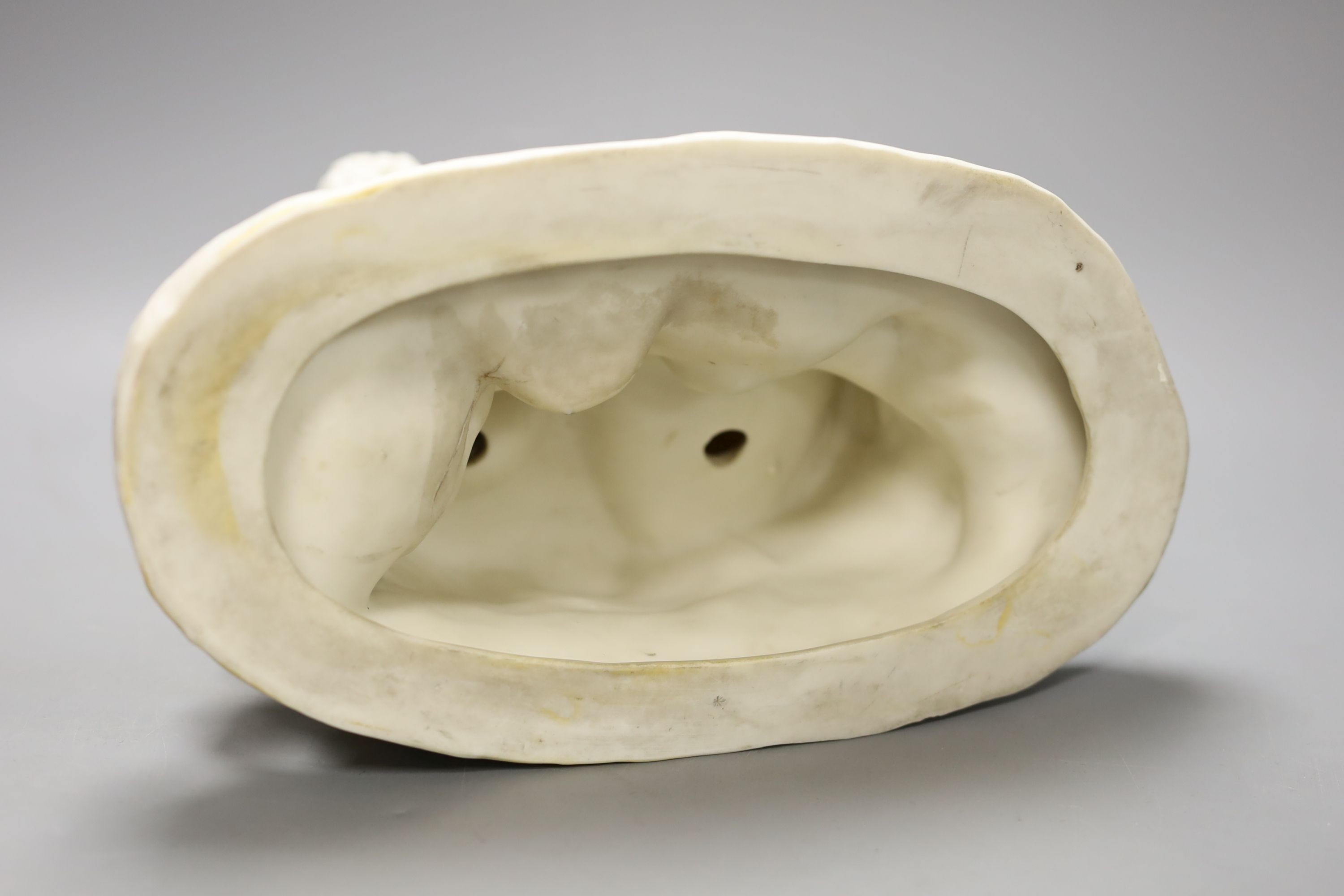 A Copeland parian group of Paul and Virginia after a model by C. Cumberworth, the couple seated with Paul offering a small bird's nest to Virginia, 29.5 cm high
